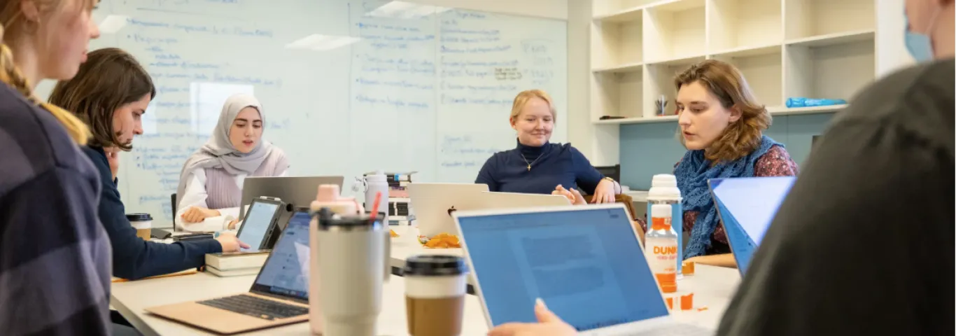 Students collaborate in the classroom as part of the AI Humanities Lab, where scholars explore how artificial intelligence can both analyze the humanities and be critically examined as a cultural force. (Credit: Sean Garcia)