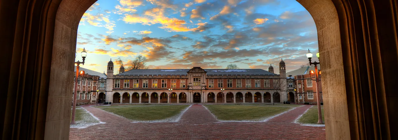 view of Ridgley Hall through the archway of Brookings Hall