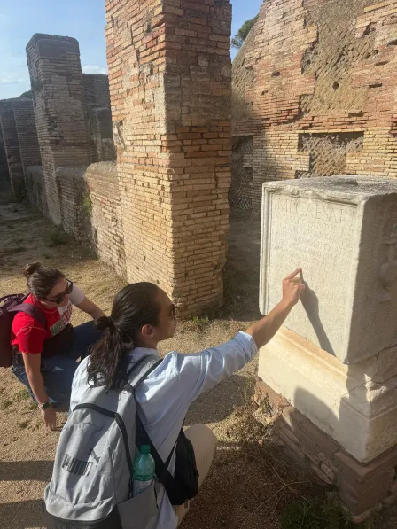 Prof Erdman points to a Latin inscription