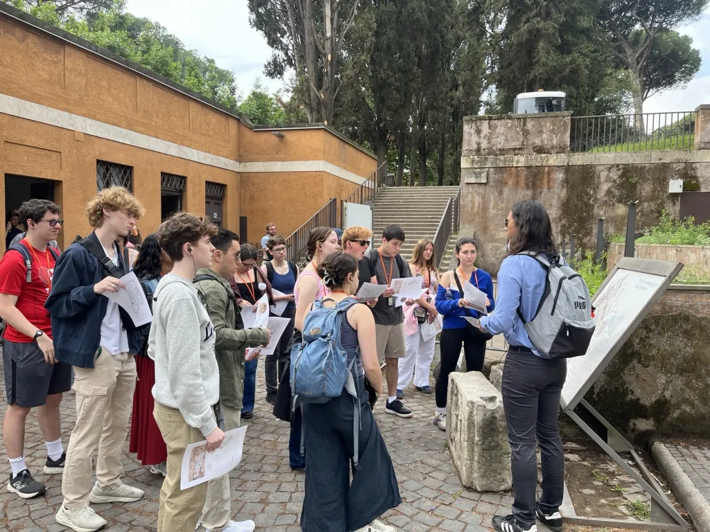 students listening to Prof. Erdman