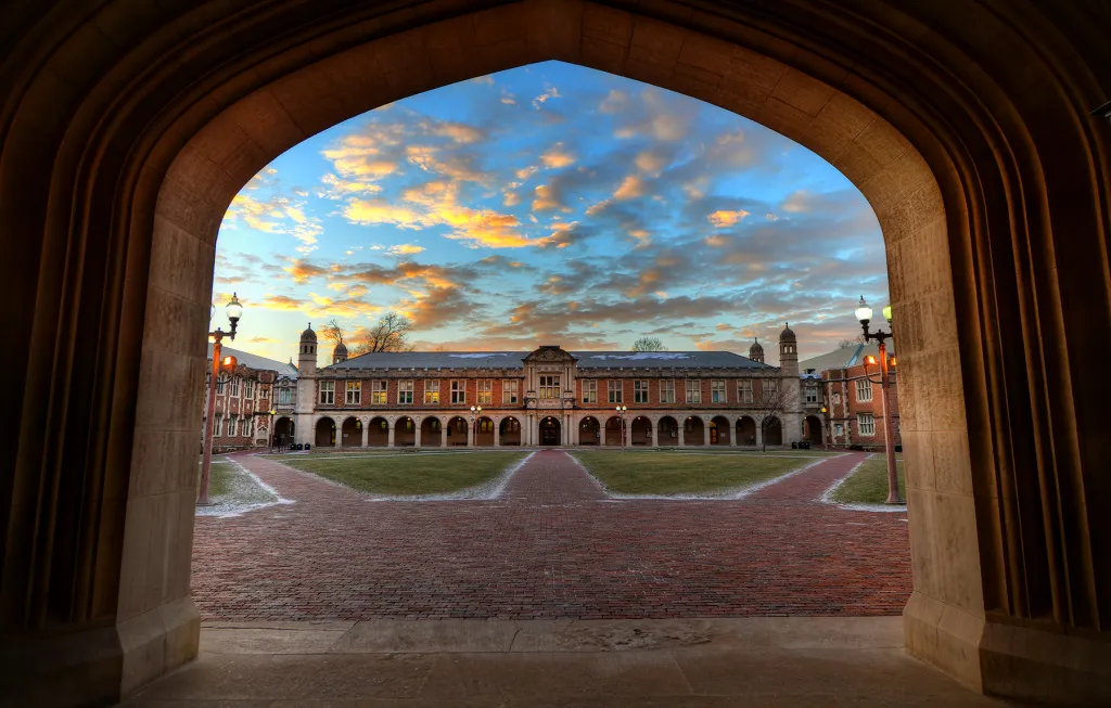 view of Ridgley Hall through the archway of Brookings Hall
