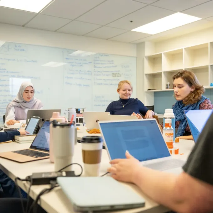 Students collaborate in the classroom as part of the AI Humanities Lab, where scholars explore how artificial intelligence can both analyze the humanities and be critically examined as a cultural force. (Credit: Sean Garcia)