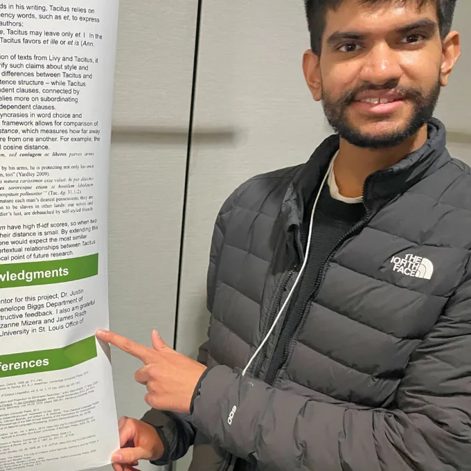 Palavajjhala presenting his data on a poster